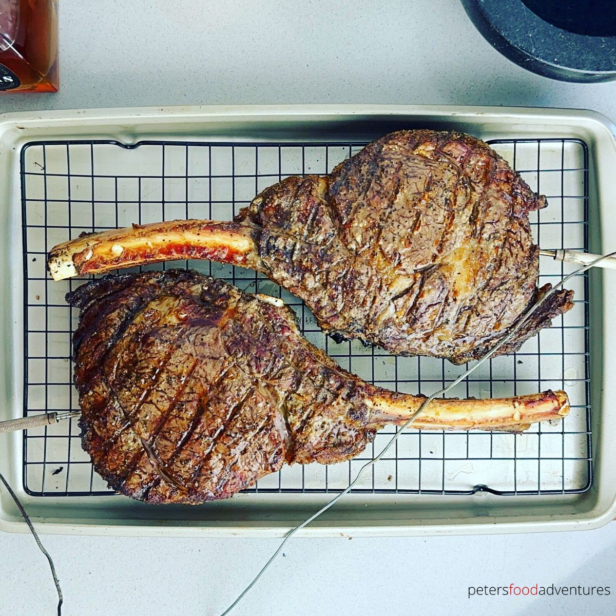 tomahawk steak on cooling rack