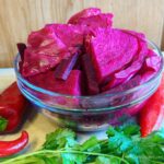 bowl of pink fermented cabbage