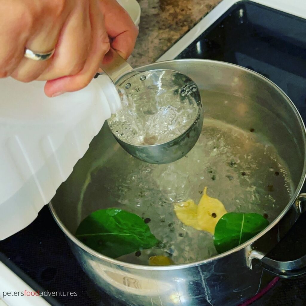 pouring vinegar in pot