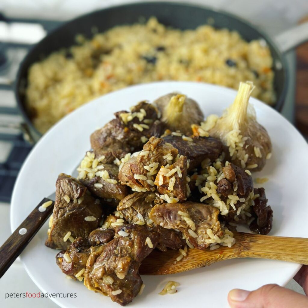 removing meat from Plov