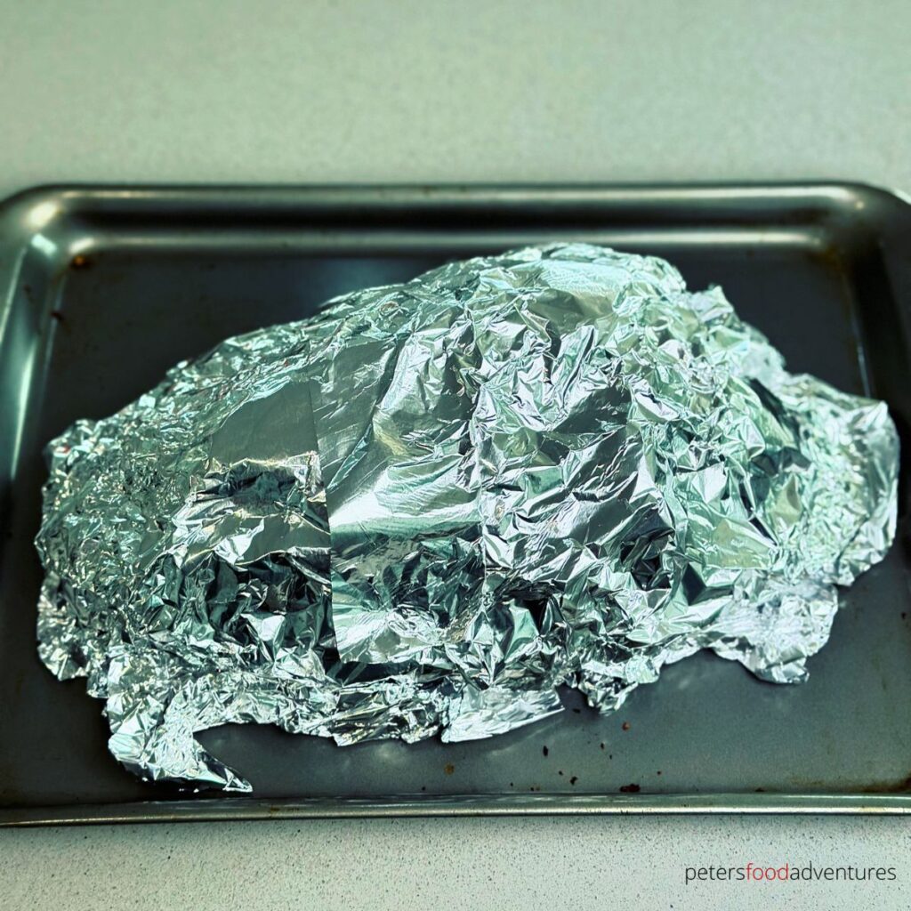 resting smoked beef in foil