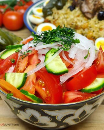bowl of tomato onion salad